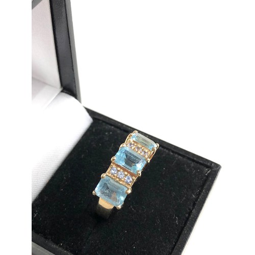 87 - 9ct gold topaz and tanzanite ring weight 4.7g