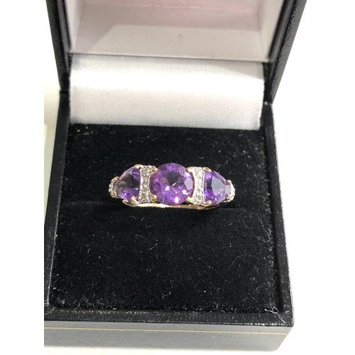 88 - Vintage 9ct gold diamond and amethyst ring weight 2.8g