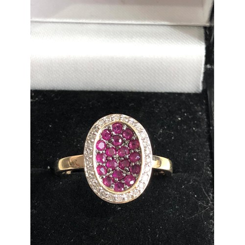 93 - 14ct gold diamond and ruby ring weight 3.9g