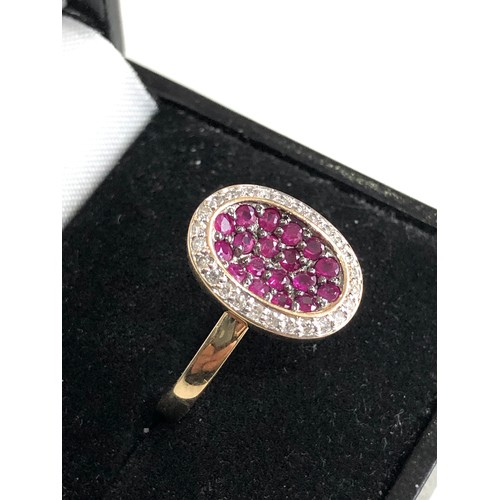 93 - 14ct gold diamond and ruby ring weight 3.9g