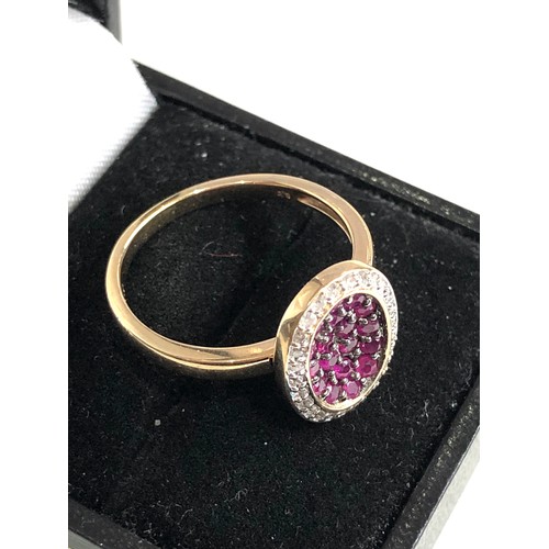 93 - 14ct gold diamond and ruby ring weight 3.9g