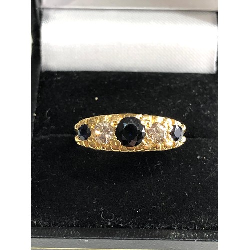 104 - 18ct gold diamond and sapphire ring weight 5.6g