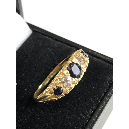 104 - 18ct gold diamond and sapphire ring weight 5.6g