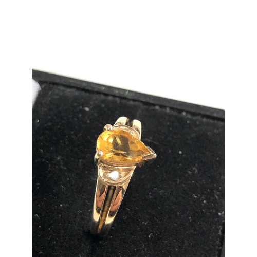 106 - 9ct gold diamond and citrine ring weight 2.6g