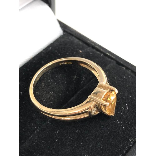 106 - 9ct gold diamond and citrine ring weight 2.6g