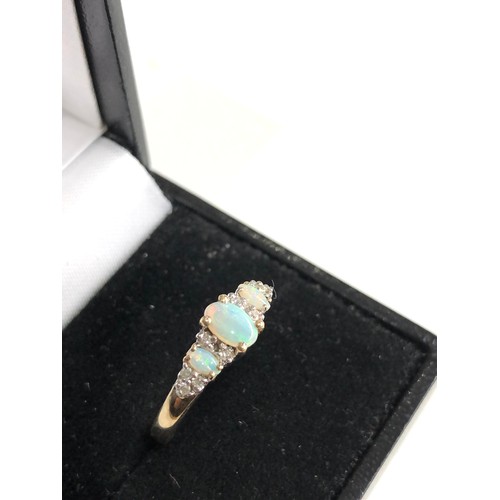 109 - 9ct gold diamond and opal ring weight 1.8g