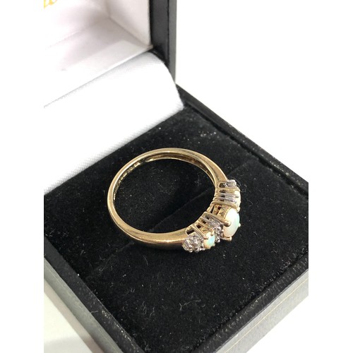 109 - 9ct gold diamond and opal ring weight 1.8g