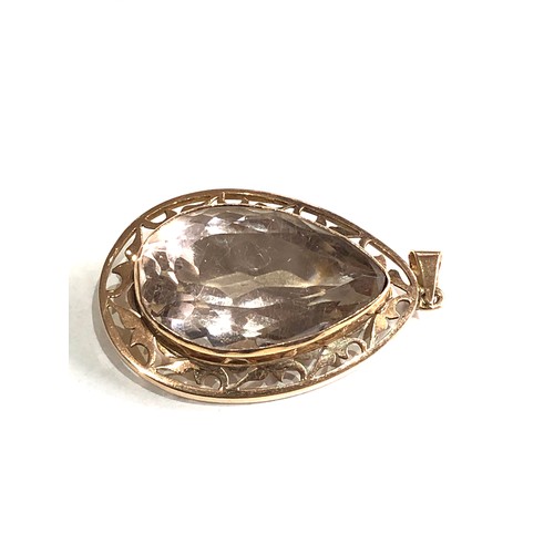 116 - 14ct gold stone set pendant measures approx 4.2cm drop by 2.4cm wide weight 8.9g