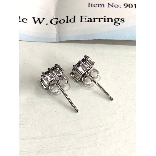 122 - Certificated 9ct gold lolite white gold earrings