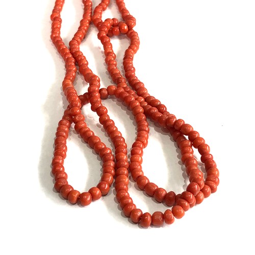 130 - Fine long antique coral bead necklace measures approx 64ins long beds measure approx 6mm dia weight ... 