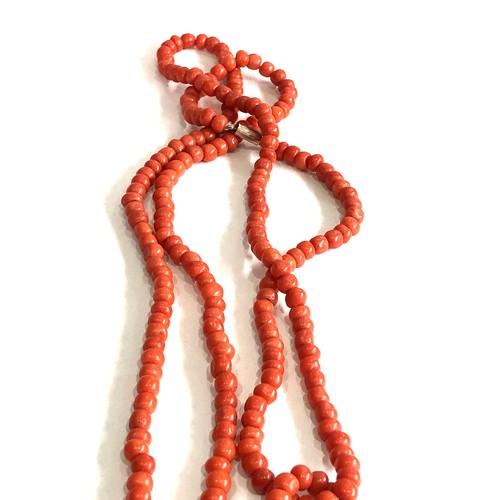 130 - Fine long antique coral bead necklace measures approx 64ins long beds measure approx 6mm dia weight ... 