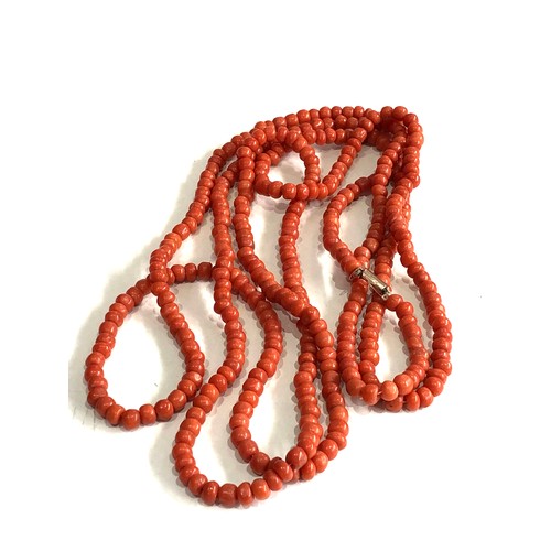 130 - Fine long antique coral bead necklace measures approx 64ins long beds measure approx 6mm dia weight ... 