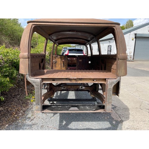 99B - VW Bay Window Camper 1972 T2 (Crossover Model), Comes on a rolling dolly ready to transport. This is... 