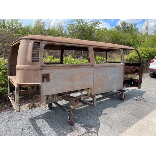 99B - VW Bay Window Camper 1972 T2 (Crossover Model), Comes on a rolling dolly ready to transport. This is... 