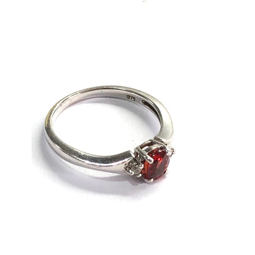 81 - 9ct white gold fire opal & diamond ring weight 2.6g