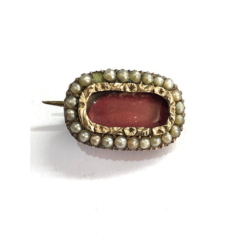 93 - 9ct gold georgian pearl mourning brooch measures approx 2.1cm by 1.3cm weight 3.3g missing small pea... 