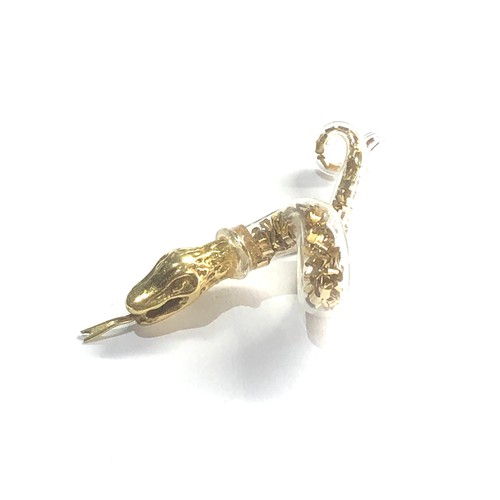 98 - 18ct gold snake weight 4.8g body made of small gold chips in casing as shown measures approx 5cm lon... 