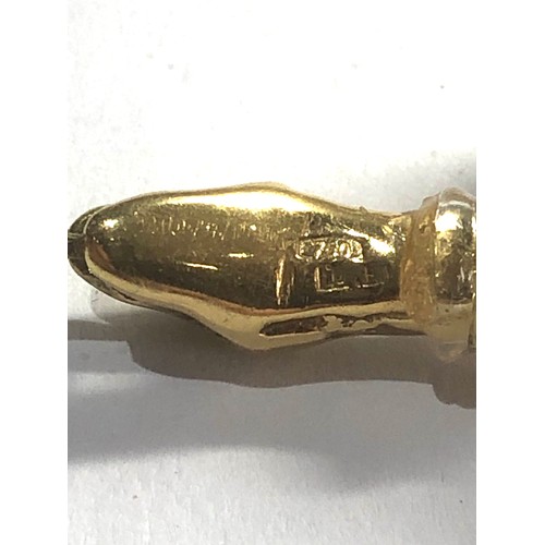 98 - 18ct gold snake weight 4.8g body made of small gold chips in casing as shown measures approx 5cm lon... 