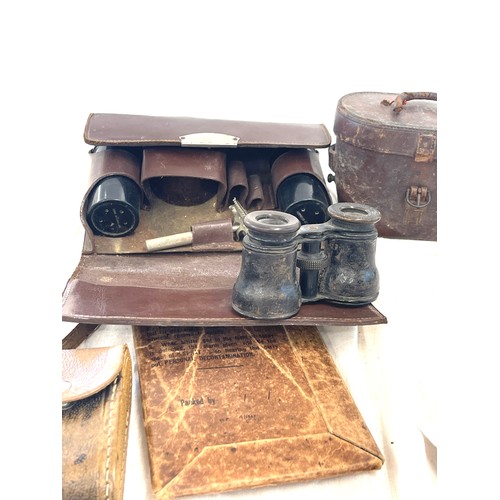 114 - Tray of miscellaneous items includes binoculars, rhythm travel clock etc