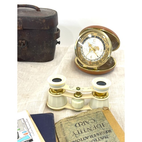 114 - Tray of miscellaneous items includes binoculars, rhythm travel clock etc