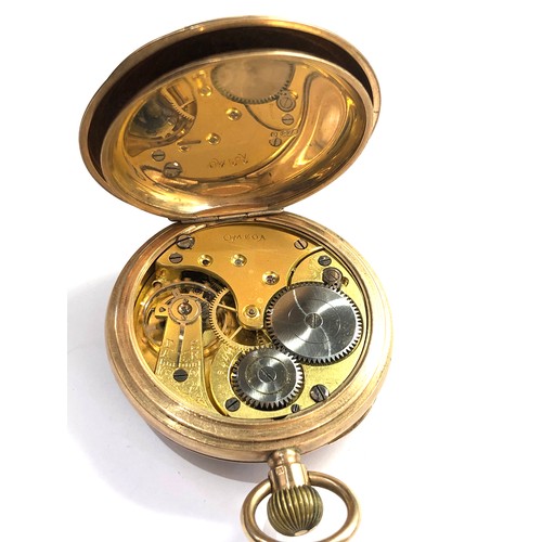 488 - 9ct gold omega pocket watch gold dust cover weight of watch 98g engraved back case measures approx 5... 