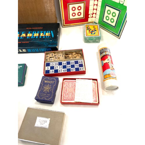 254 - Selection of vintage games includes snakes and ladders, ludo, scrabble, puzzles etc