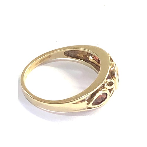 111 - 9ct gold garnet ring weight 2.6g