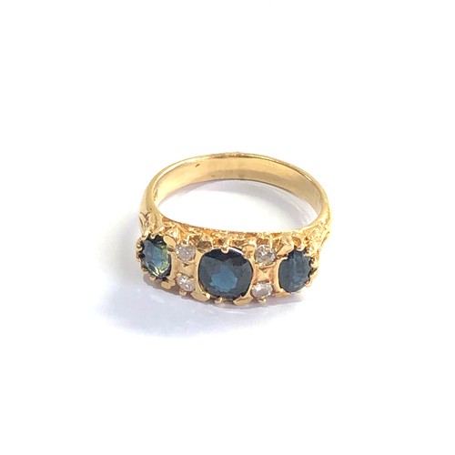 112 - 18ct gold diamond and sapphire ring weight 5.3g