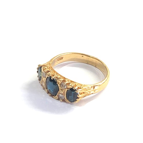 112 - 18ct gold diamond and sapphire ring weight 5.3g