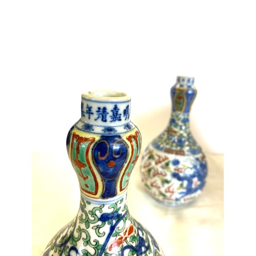 84 - Pair of Oriental vases measure approx 9.5