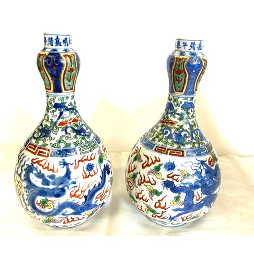 84 - Pair of Oriental vases measure approx 9.5