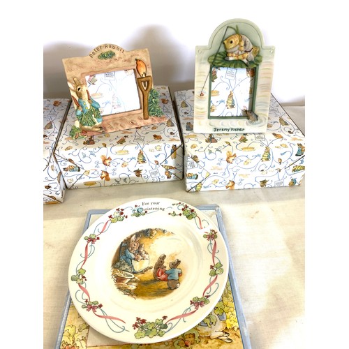 86 - 3 boxed Peter rabbit picture frames and a Boxed Wedgwood peter rabbit bowl