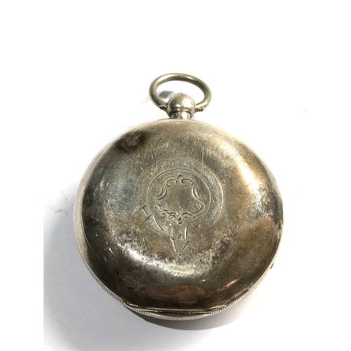 490 - Large Silver dial open face pocket watch in working order but no warranty given missing second hands... 