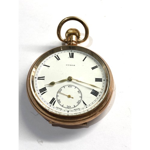 502 - Cudos gold plated open face pocket watch hand winding working order but no warranty given