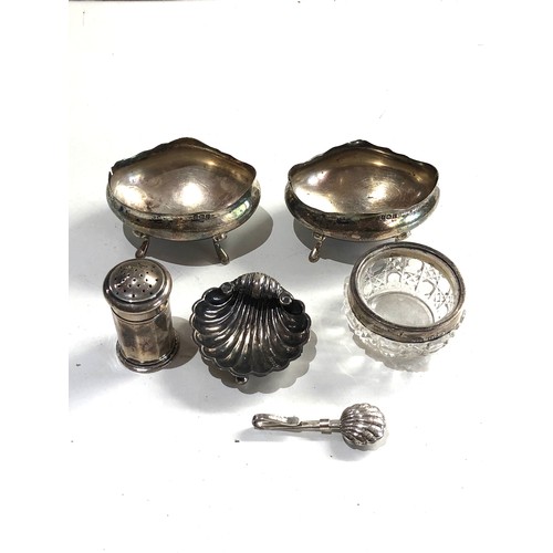 66 - Selection of silver items salt peppers etc