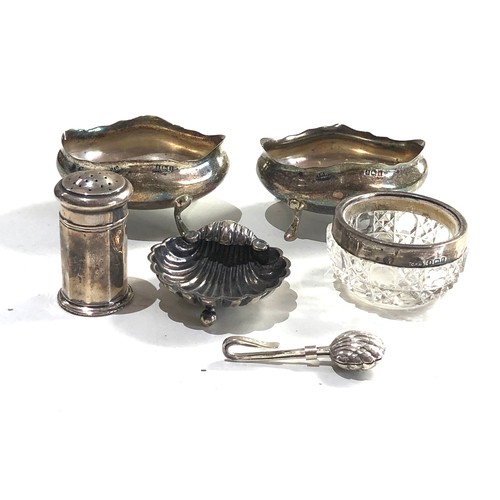 66 - Selection of silver items salt peppers etc