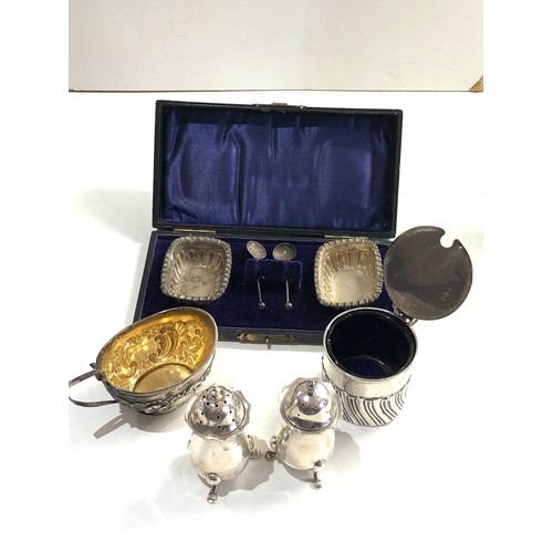 60 - Selection of silver items salt peppers etc