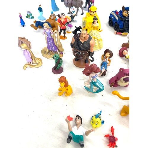 74 - Disney toy figures to include Dwarfs, Shrek, Rapunzel, cinderella, monsters, Paw patrol, Lion King, ... 