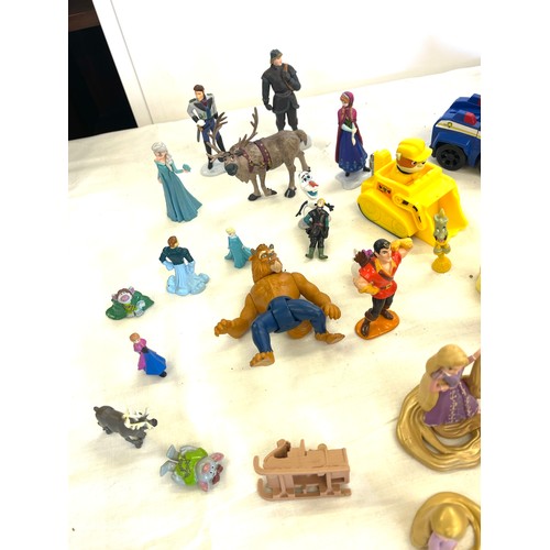 74 - Disney toy figures to include Dwarfs, Shrek, Rapunzel, cinderella, monsters, Paw patrol, Lion King, ... 