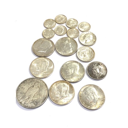 519 - Selection of silver U.S.A coins includes half dollars one dollars etc weight 145g