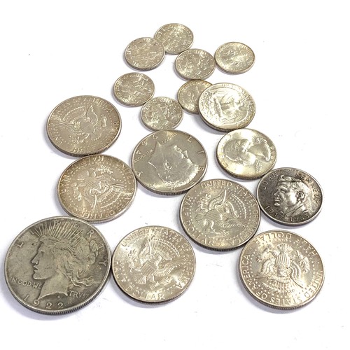 519 - Selection of silver U.S.A coins includes half dollars one dollars etc weight 145g