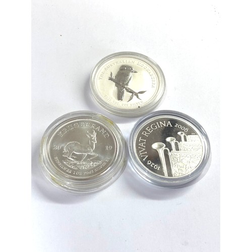 521 - 3 cased silver coins includes australia 1 dollar silver krugerrand and silver 5 pounds