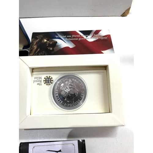 528 - Selection of 5 silver coins includes royal mint £2 britannia quarter ounce , 2 silver proof £2 etc