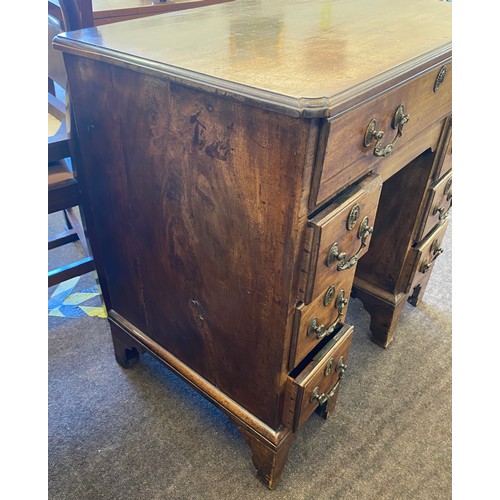 375 - Period knee hole desk, cupboard under, secretare top drawer, approximate measurements: Height 33.5 i... 