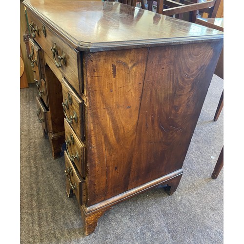 375 - Period knee hole desk, cupboard under, secretare top drawer, approximate measurements: Height 33.5 i... 