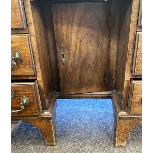 375 - Period knee hole desk, cupboard under, secretare top drawer, approximate measurements: Height 33.5 i... 