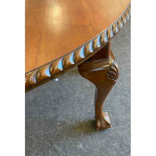 397 - Mahogany pie crust wind out table, with ball and claw feet, 2 leaves, overall good condition, approx... 