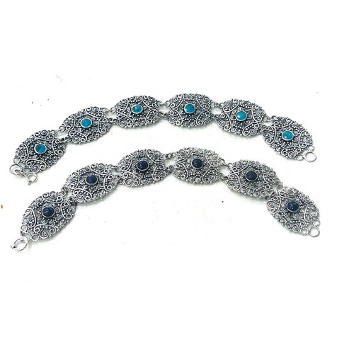 675 - 2 Ladies silver ornate detailed bracelets, stone set