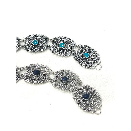 675 - 2 Ladies silver ornate detailed bracelets, stone set