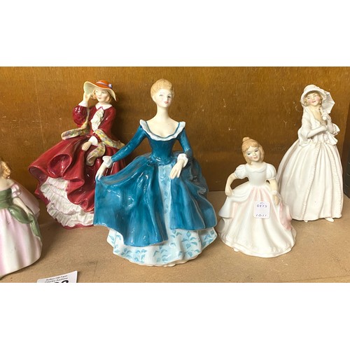 108 - Selection of porcelain ladies to include Royal Doulton etc